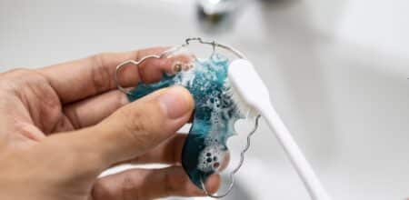 How to Effectively Clean Plaque From Your Retainer: Essential Tips